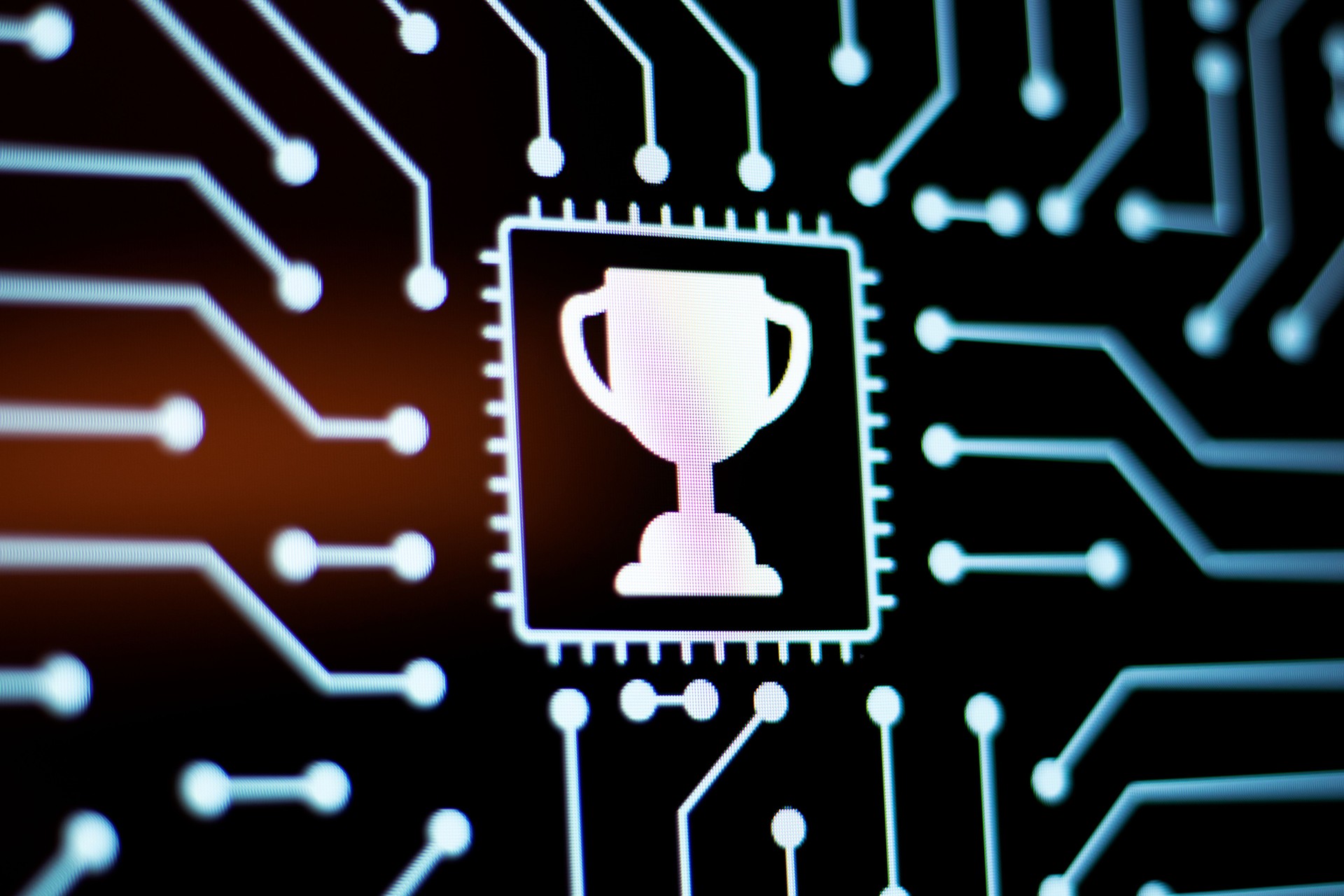 Technology Background and Circuit Board With Trophy Award icon. Close-Up Computer Screen Concept.